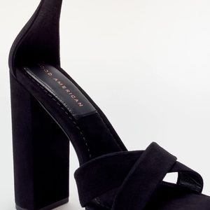 Sky high black suede platform heels